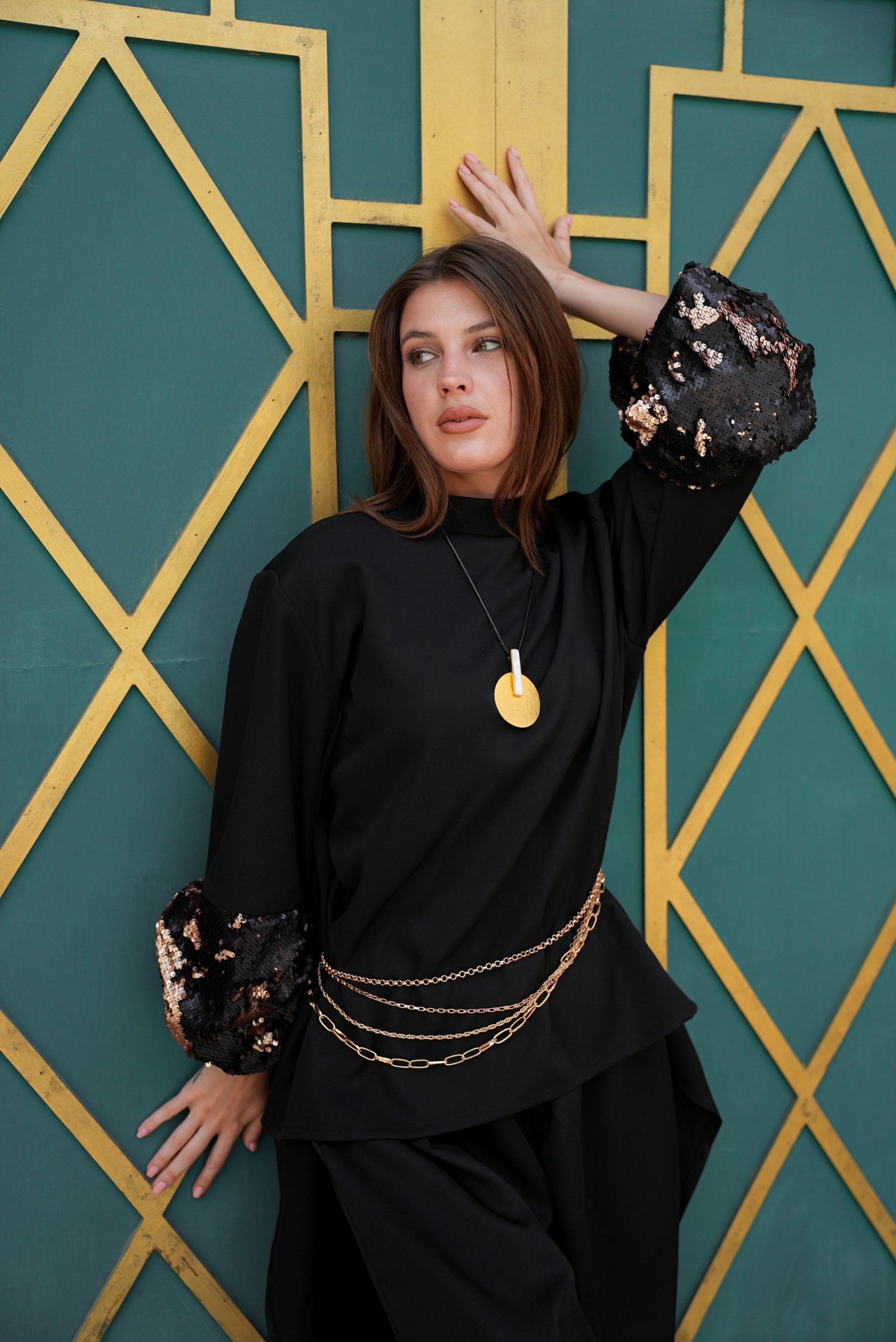 black top with bronze